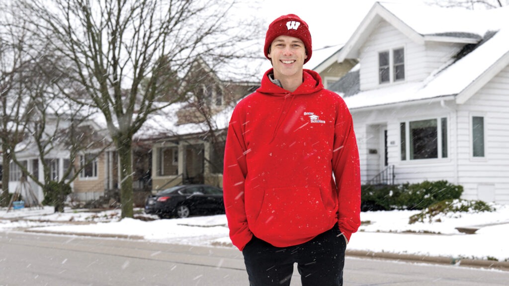 Jake Piekarski wearing a red sweatshirt in the snow