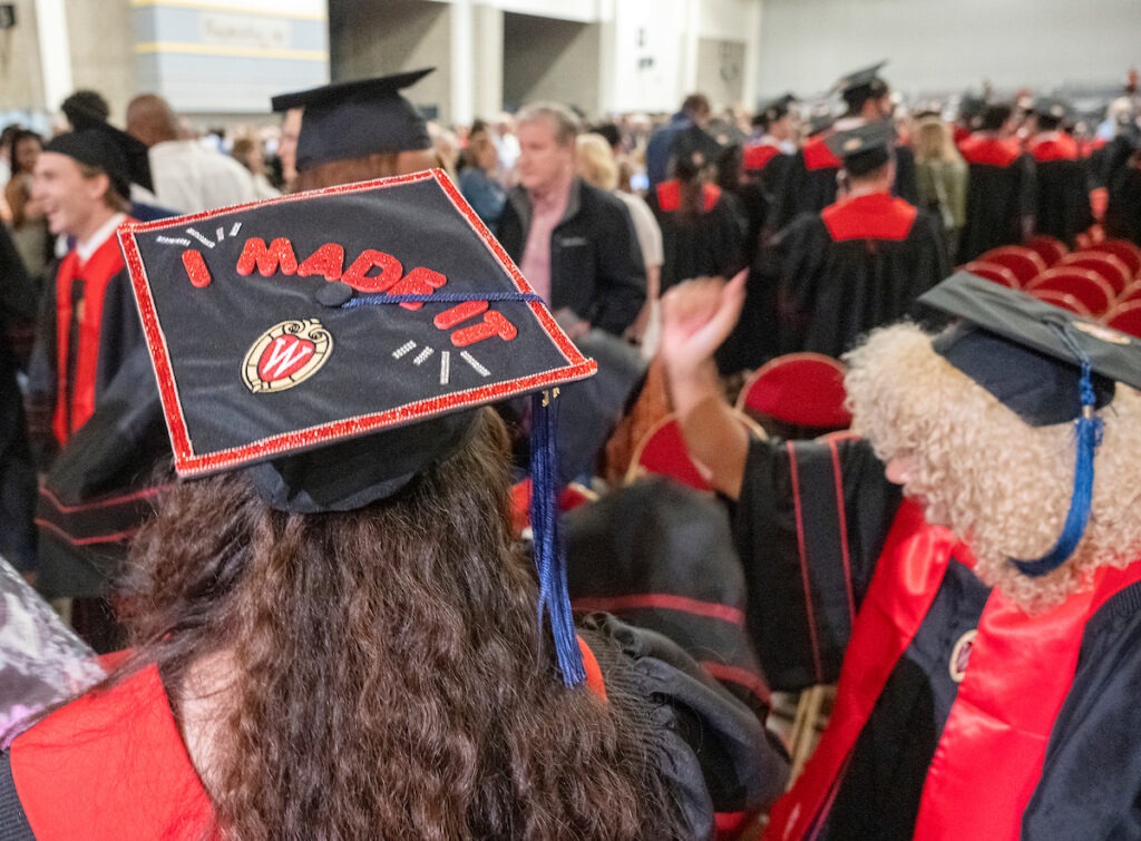 Wisconsin School of Business graduates celebrate during the Spring 2023 Undergraduate Graduation Celebration on Friday afternoon, May 12, 2023, at the Alliant Energy Center -Expo Center. (Paul L. Newby, II /UW-Madison Wisconsin School of Business)