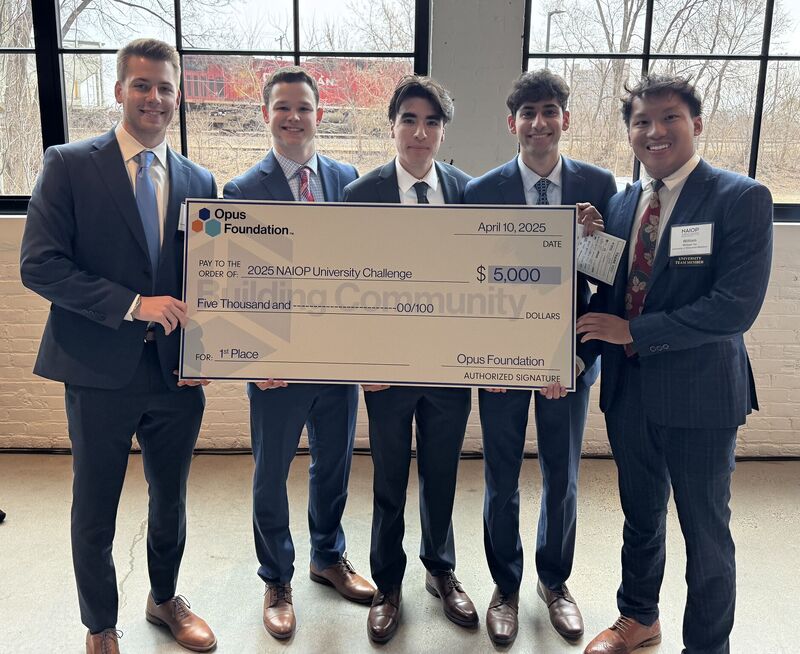 (Left to right) Mason Strain, Andrew Walsh, Sebastian Alcantar, Veeraj Luthra, and Will Vu holding their first place check