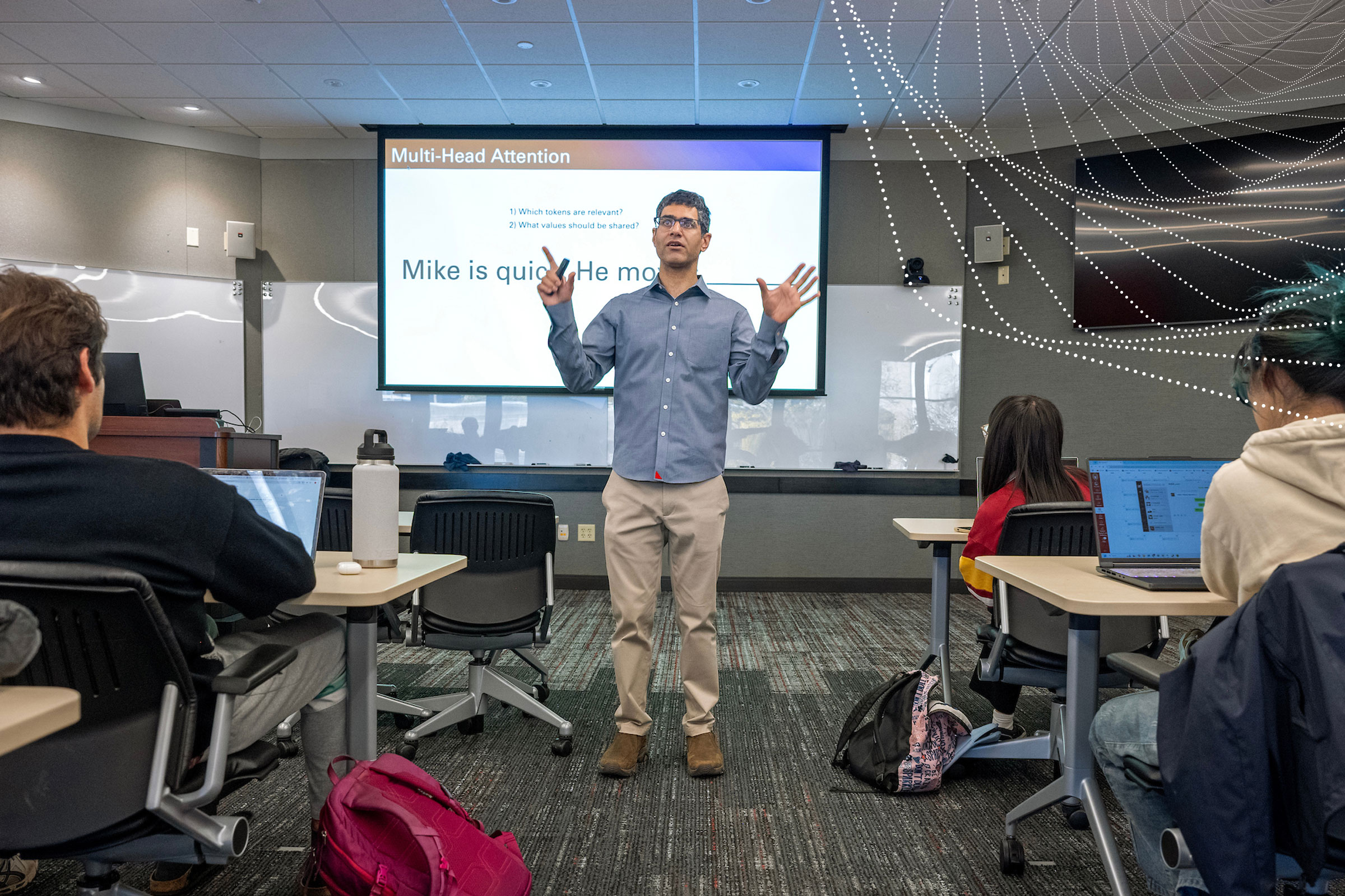 AI entrepreneur Ishan Anand teaches a class on machine learning.