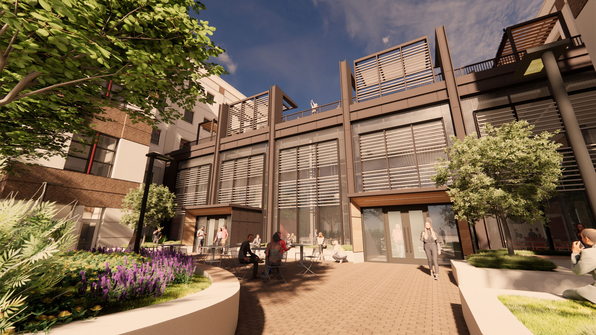 A rendering of the renovated courtyard outside Grainger Hall, to be completed in phase three of the Badger Blueprint renovation in 2026. The outdoor space features flowers and trees in raised concrete beds, as well as tables and chairs.