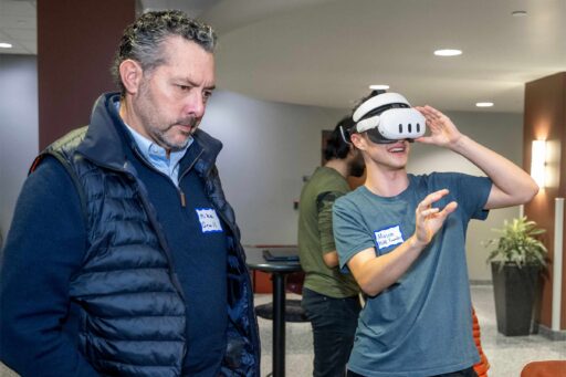 A student uses a virtual reality headset during a Tech Exploration Lab event.