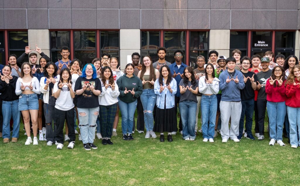 group photo of BEL scholarship students in front of Grainger Hall