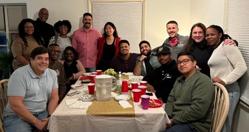Consortium students posing at a dinner