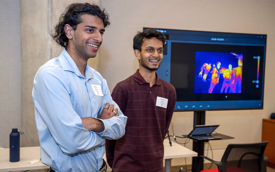Students Kathan Reddy and Shobhin Basu pictured next to the thermal imaging camera
