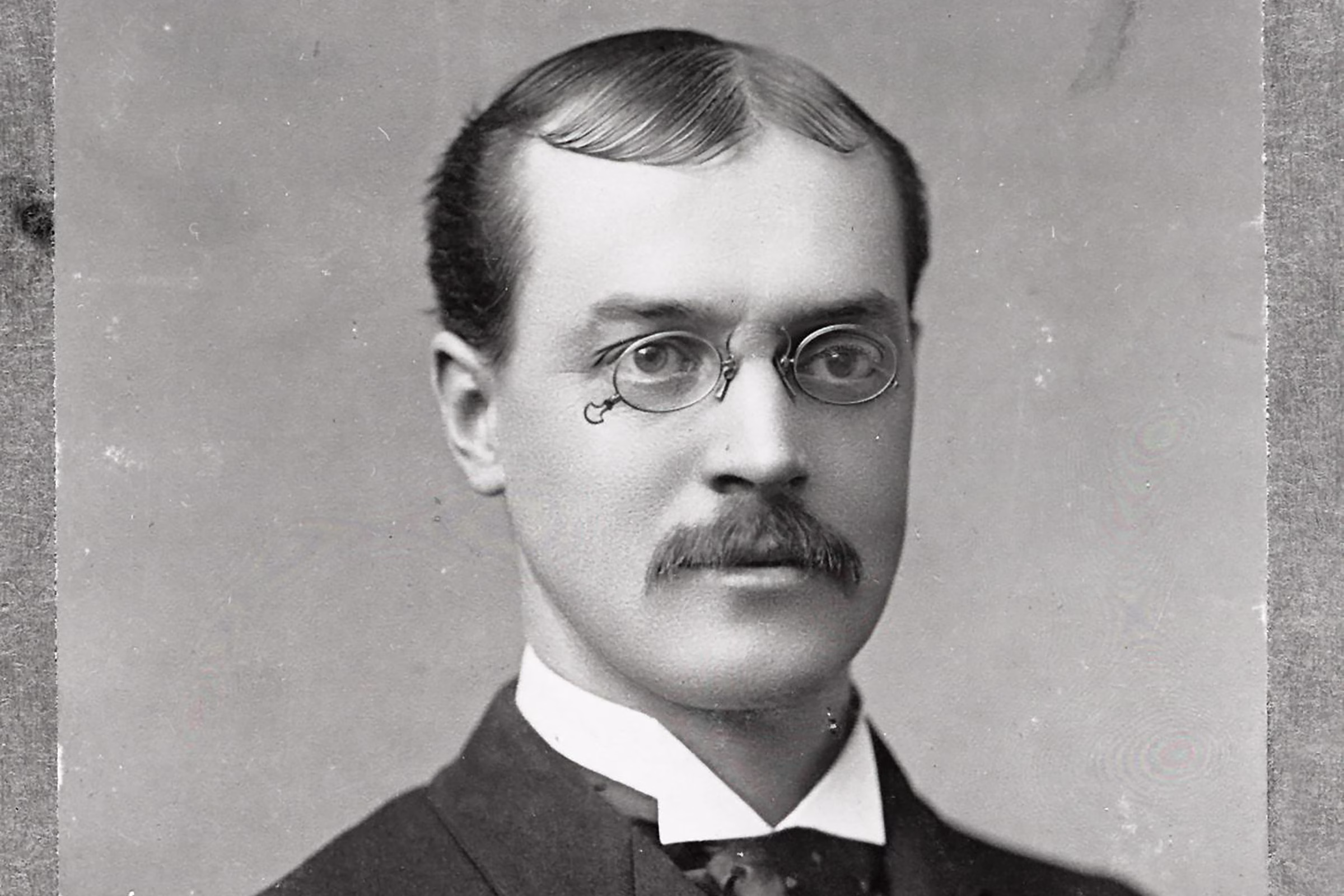 A black and white photo of Professor William A. Scott.