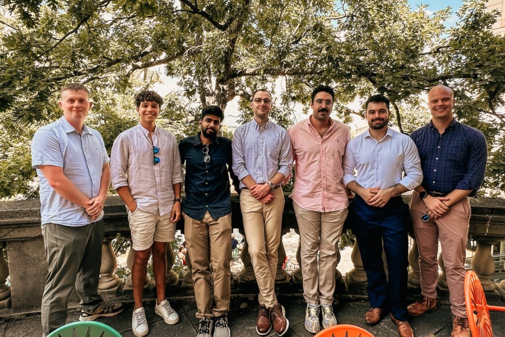 Seven scholarship recipients from the Don Condon Fund stand together on the Memorial Union Terrace.