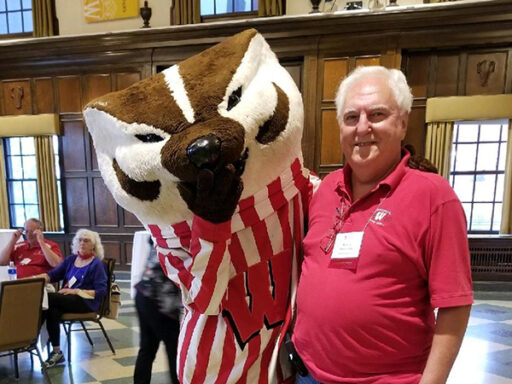 William Rauwerdink poses with Bucky Badger.
