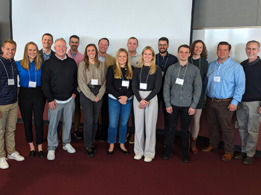 Cassie Warton stands with other members of the Grainger Center Alumni Advisory Board.