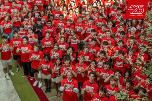 WSB at 125; A Legacy in Motion; Business Badgers pose for a photo at the Wisconsin Institute for Discovery
