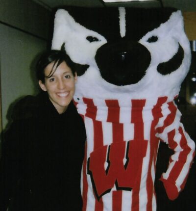 Bucky Badger poses with Kaylene Reilly Christnovich.