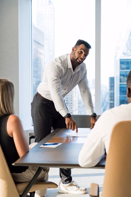 Bryson leading a meeting.