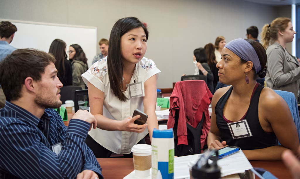 Students work on their project in Senior Lecturer Phil Greenwood's Entrepreneurship Simulation class.