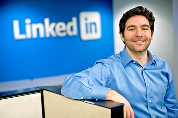 Jeff Weiner in front of a LinkedIn sign.