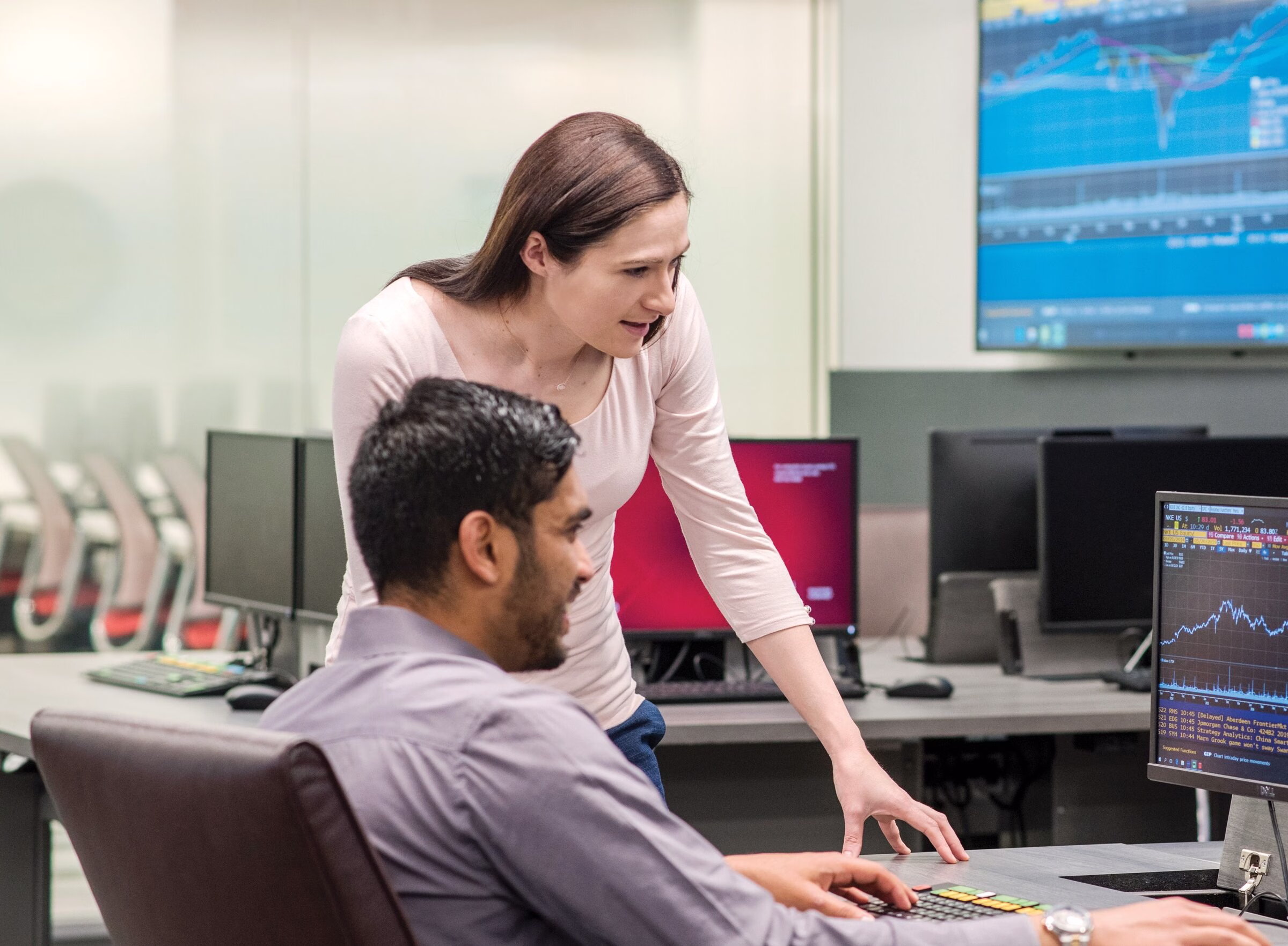 Two students working at a computer.