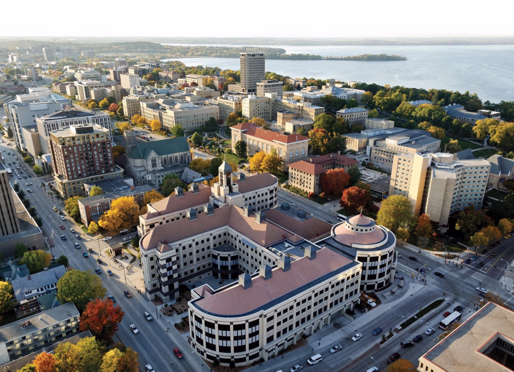 An aerial view of Grainger Hall and its campus surroundings.