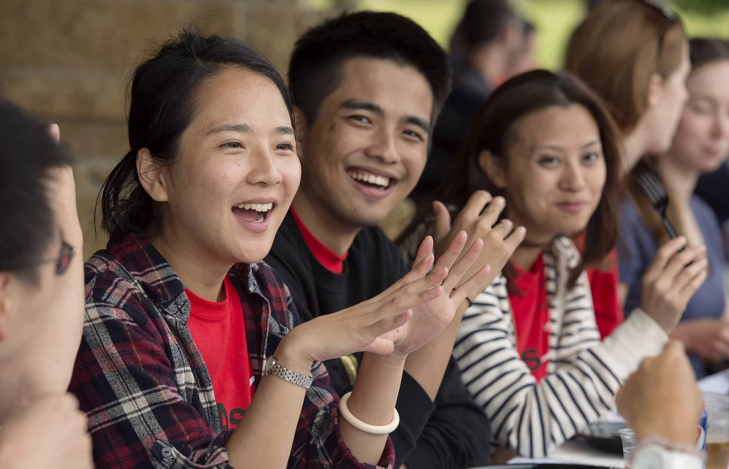 MBA students chatting during the Welcome Back Picnic at Brittingham Park.