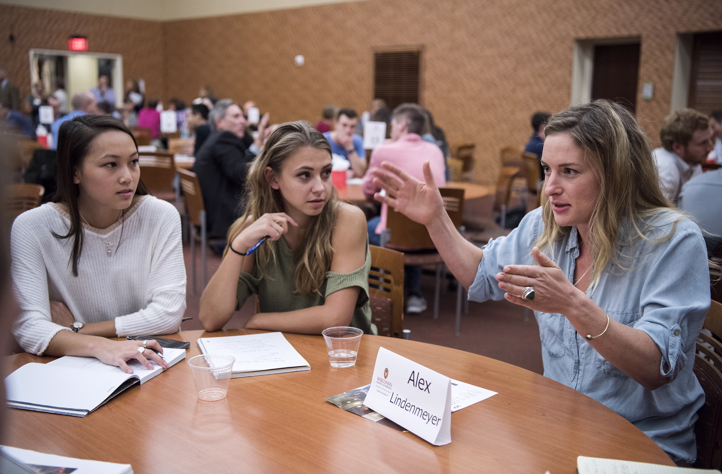 Students seated at table.