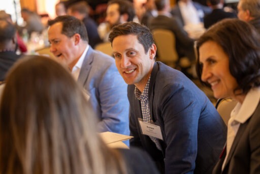 Event attendee sitting in crowd