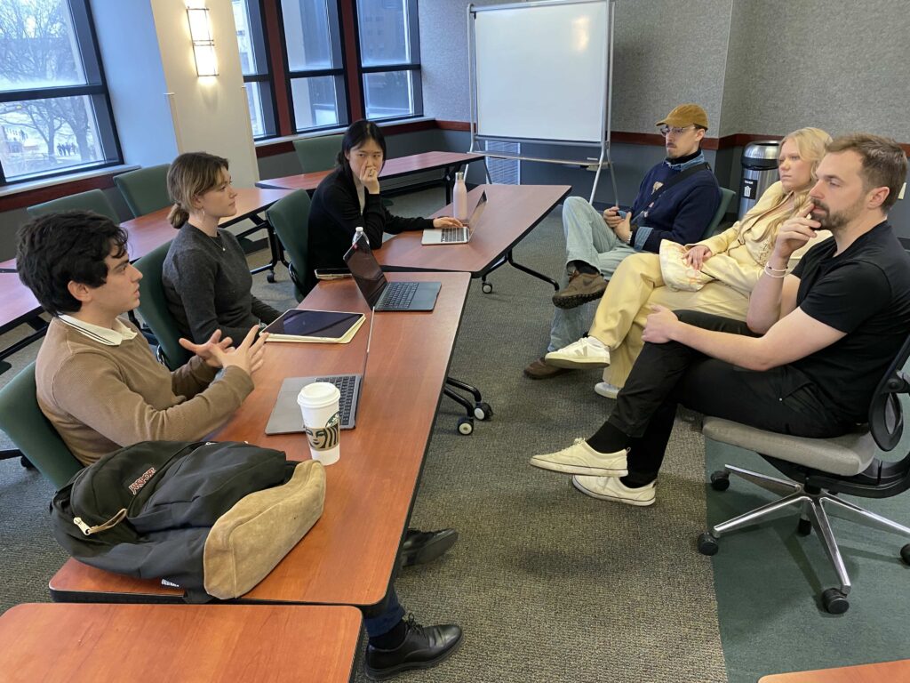 Another Student Team meeting with Judges at the Startup Open