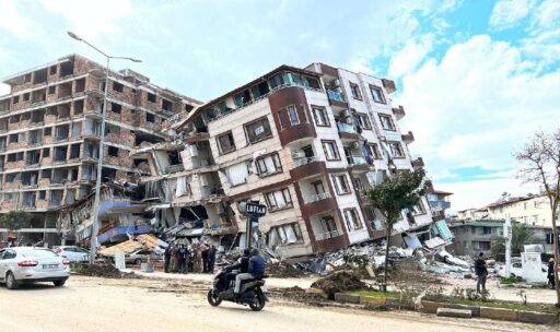 Photo of multi-level buildings leaning after earth quake damage after the 2023 Kahramanmaras earthquake.
