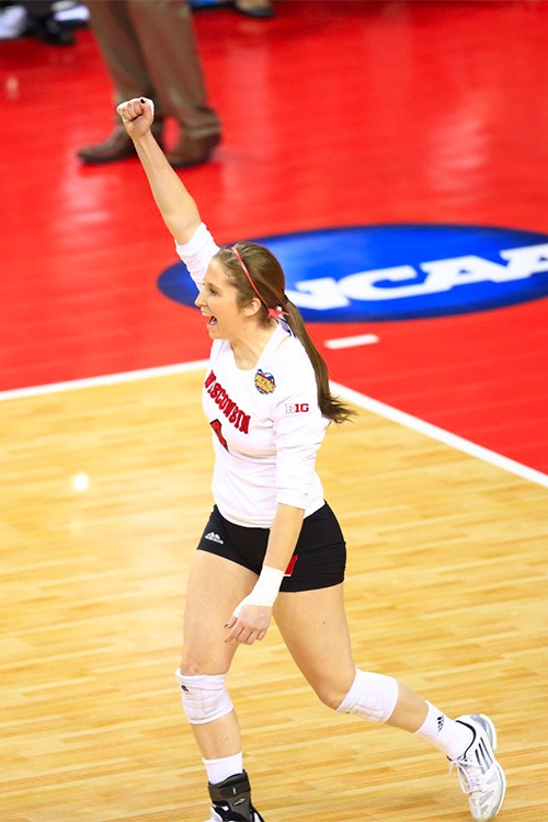Annemarie cheering on the volleyball court.