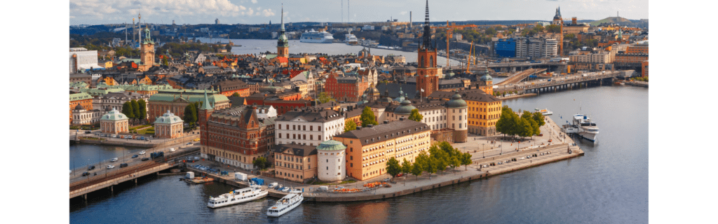Buildings near a lake in Sweden.