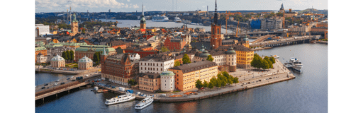 Buildings near a lake in Sweden.